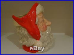 Royal doulton large santa character jug with red green white candy cane handle