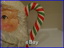 Royal doulton large santa character jug with red green white candy cane handle