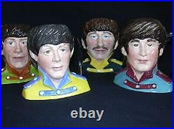 The Beatles Set Of 4 Royal Doulton Character Jugs